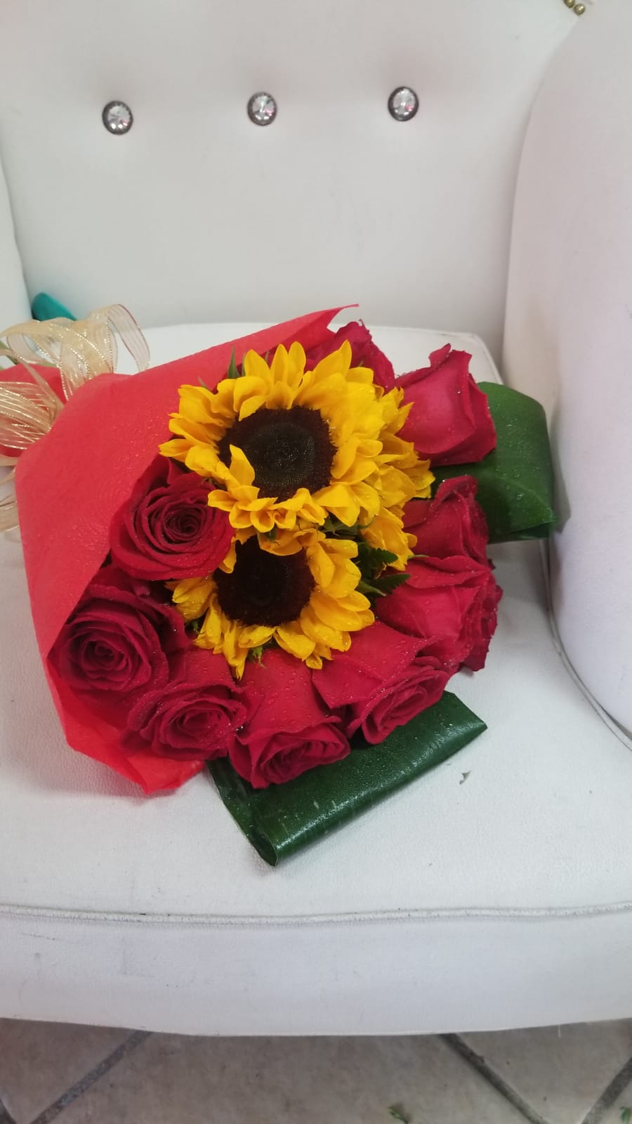 Paper wrapped Roses and sunflowers